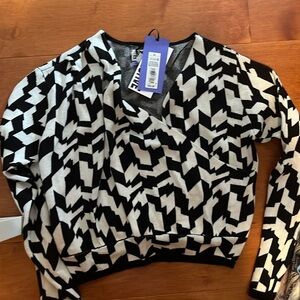 V neck sweater - mid drift showing